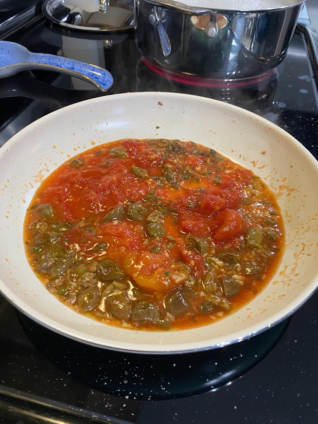 Puttanesca sauce simmering.